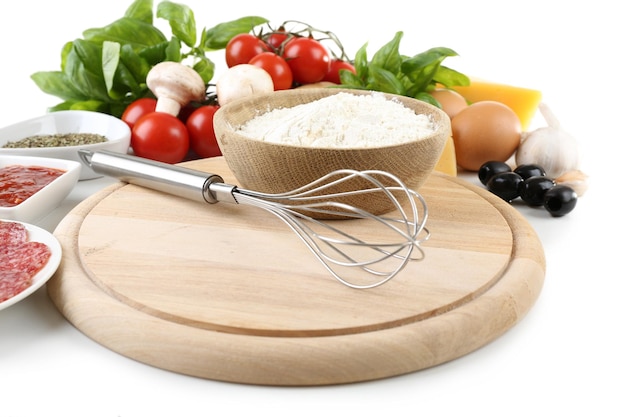 kitchen workspace with utensils and fresh ingredients